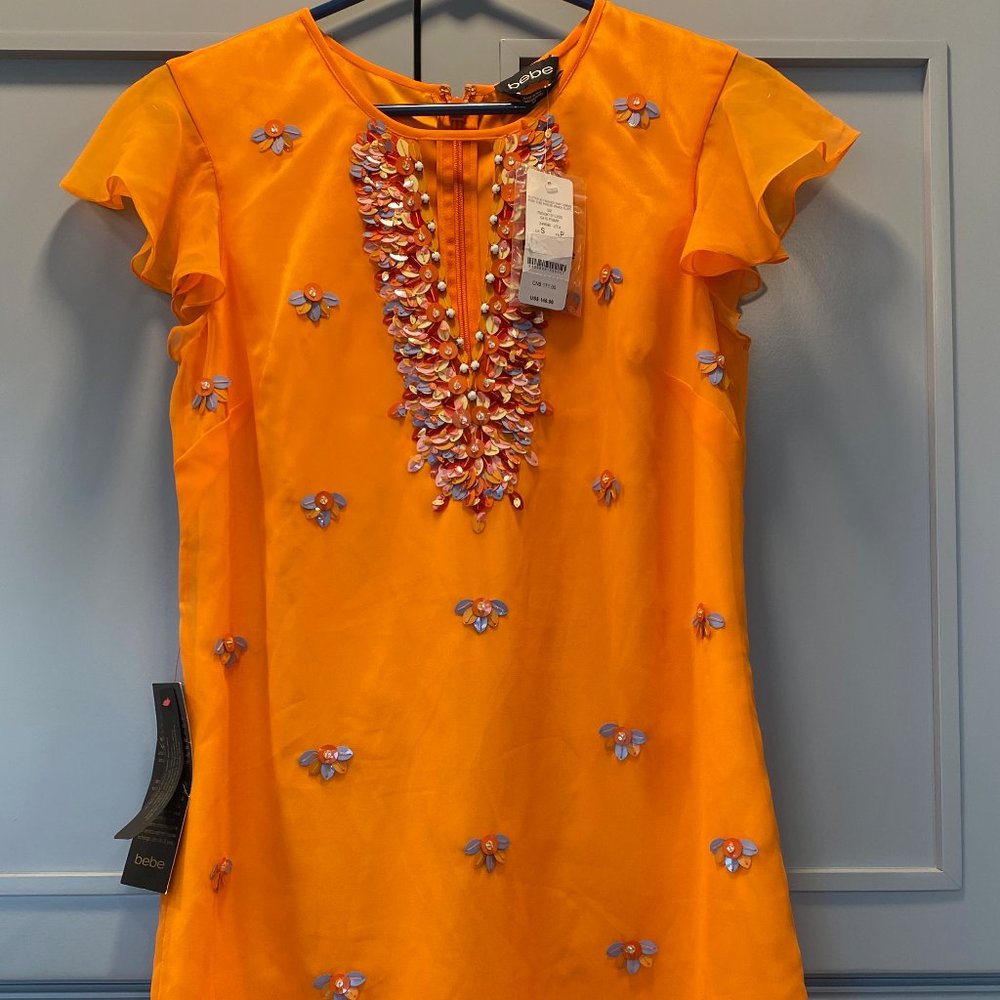 bebe orange flutter slv beaded shift dress